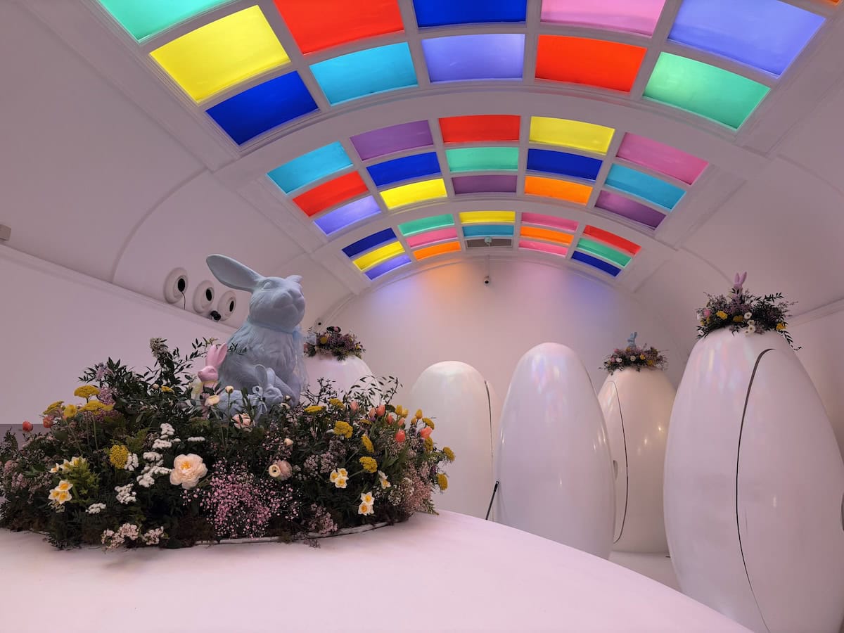 Bunnies Perched On Pods With Pastel Florals Under The Vibrant Ceiling At Sketch London