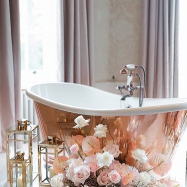 Romantic Floral Display Surrounding Bathtub At Pylewell Park