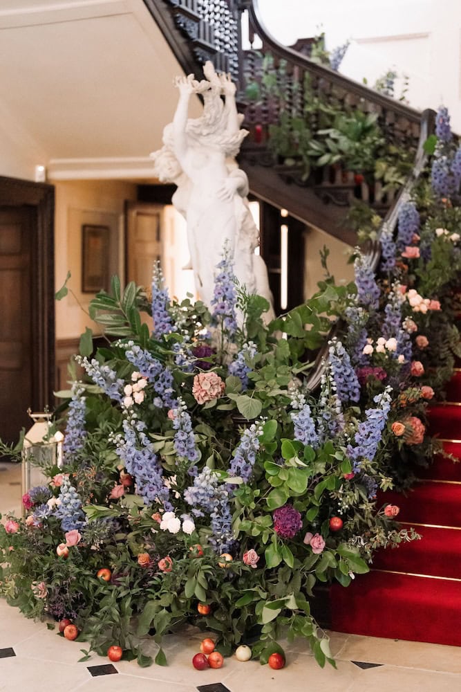 Whimsical Floral Staircase With Roses, Hydrangeas, And Delphiniums At Pylewell Park