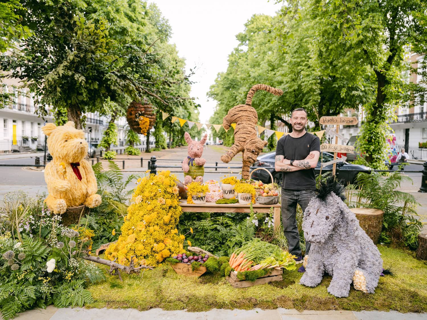 Ricky Paul Flowers Next To Winnie The Pooh Floral Installation