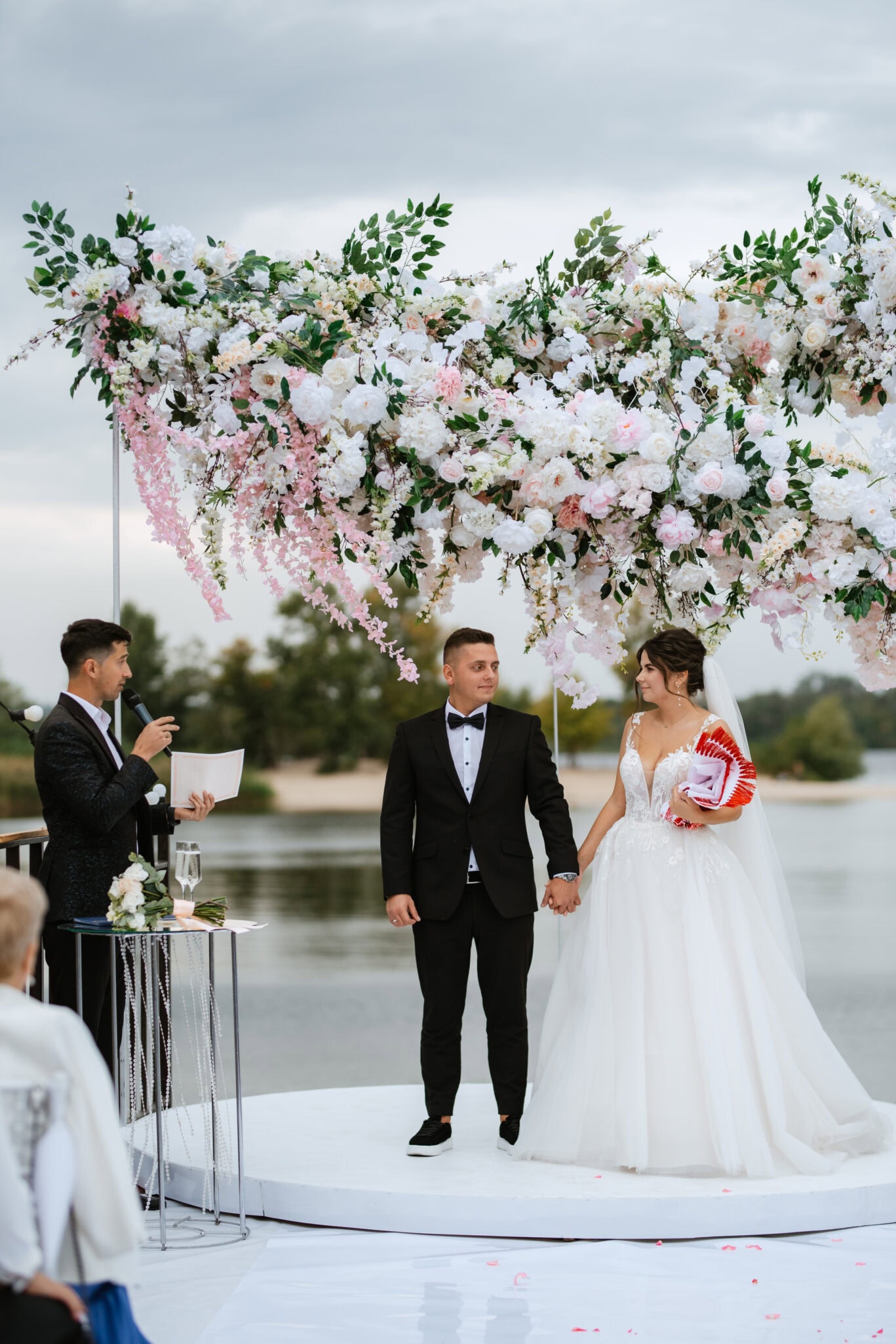 Wedding Ceremony Of The Newlyweds On The Pier